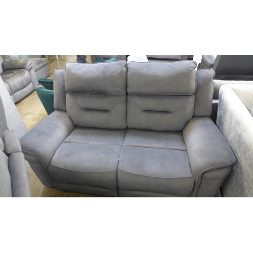 1329 - A pair of Janus charcoal upholstered two seater sofas and armchair * this lot is subject to VAT