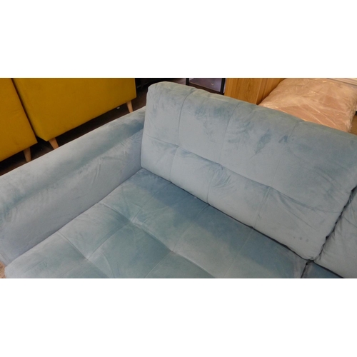 1330 - An aquamarine pinch back velvet three seater sofa