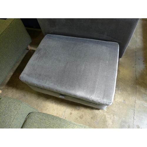 1344 - A fossil grey velvet three seater sofa and ottoman footstool