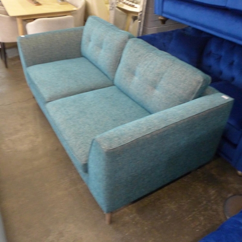 1349 - A prismarine blue upholstered 3.5 seater sofa