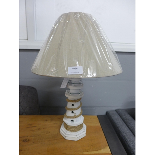 1355 - A lighthouse table lamp with cream shade H50cm (789618)