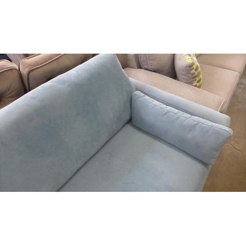 1359 - A light blue velvet upholstered four seater sofa
