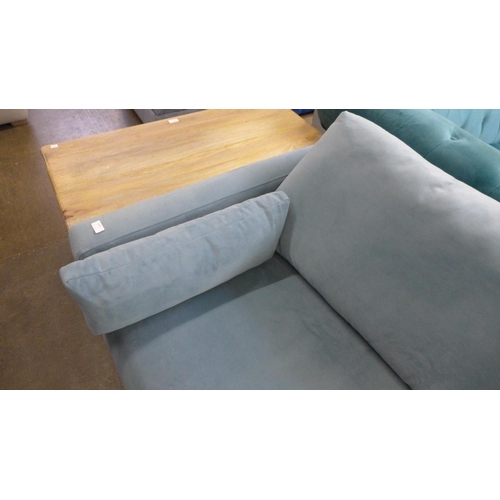 1359 - A light blue velvet upholstered four seater sofa