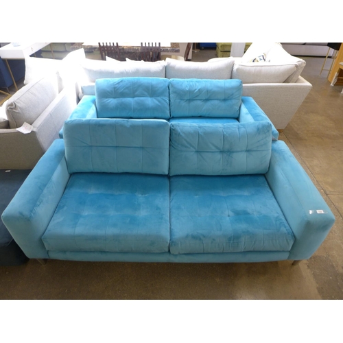 1425 - A pair of sky blue velvet three seater sofas