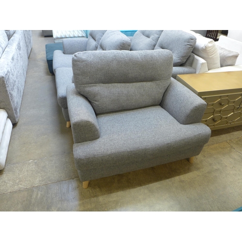 1436 - A pair of grey upholstered two seater sofas and armchair