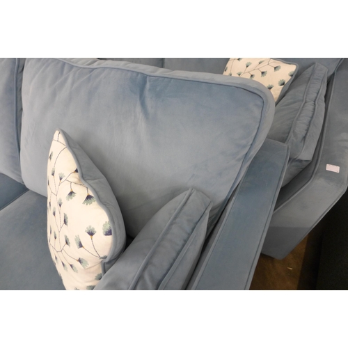 1466 - A diamond blue velvet 2.5 seater sofa with floral scatter cushions