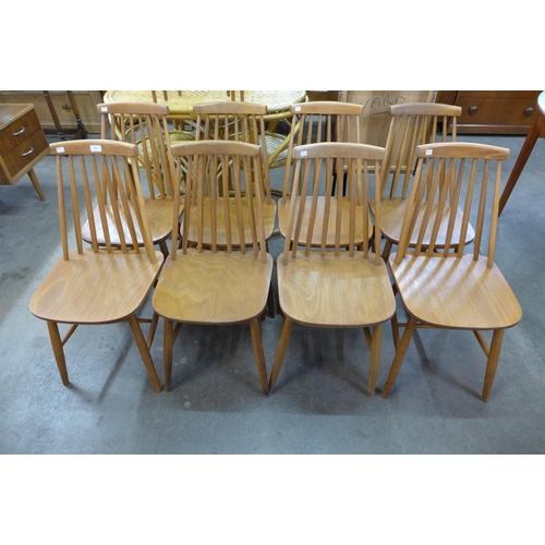 75 - A set of eight Scandinavian beech kitchen chairs