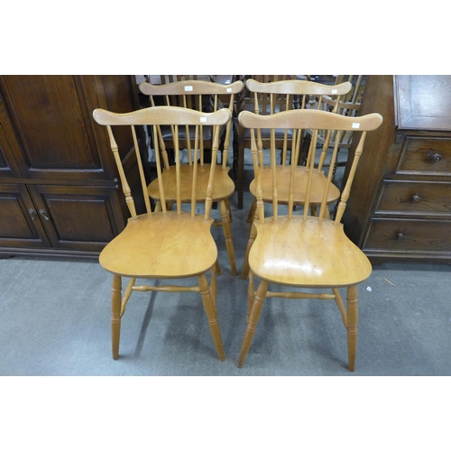 164 - A set of four beech kitchen chairs