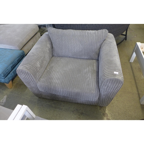 1599 - A grey jumbo corduroy oversized armchair