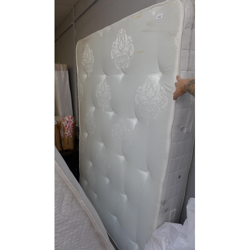 1650 - A double mattress without cover and marked