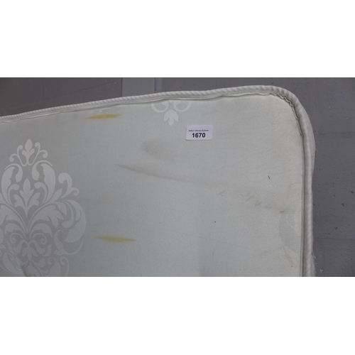 1650 - A double mattress without cover and marked