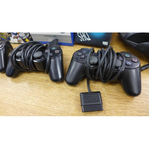 2088 - Two Playstation 1's, Playstation 2 slimline edition, 3 Playstation Duelshock 2 controllers, Playstat... 