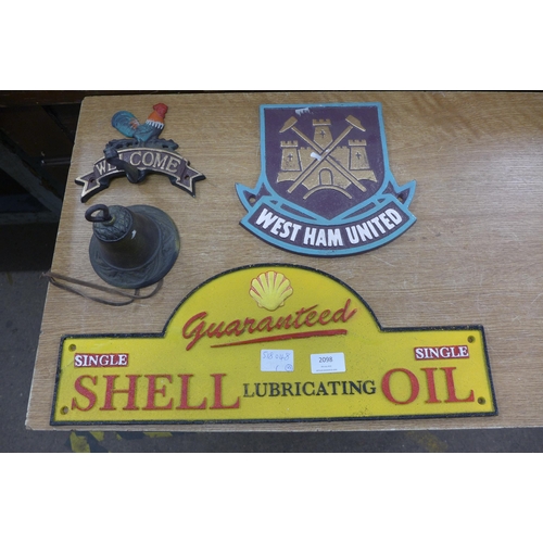 2098 - 2 Cast iron signs, Shell, West Ham United and a welcome bell