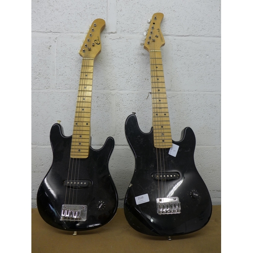 2110 - 2 x ¾ size guitars