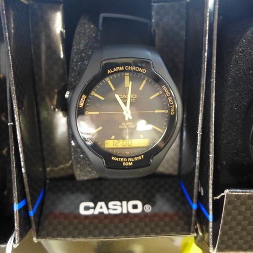 2128 - Casio diver's style watch and two Casio black and gold digital and analogue wristwatches (3) * this ... 