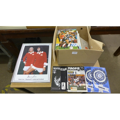 2136 - Box of football programmes & signed Dennis Law football picture