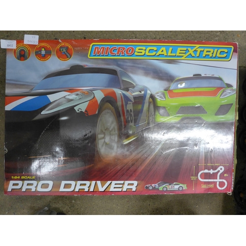 2145 - Micro Scalextric Pro Driver set and collection of action man figure model vehicles inc. jeep, tank a... 