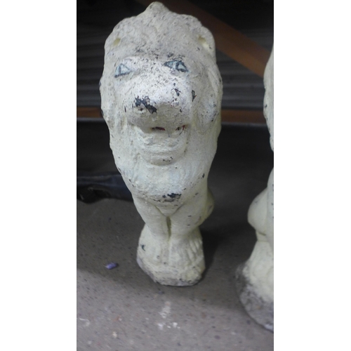 2230E - Pair of painted stone lions