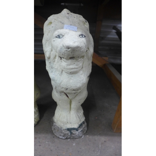 2230E - Pair of painted stone lions