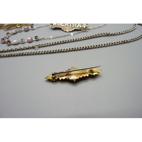 996 - A yellow metal, ruby and diamond pendant/brooch on a 9ct gold chain, pendant stamped 9K, 5g, 2.6cm p... 