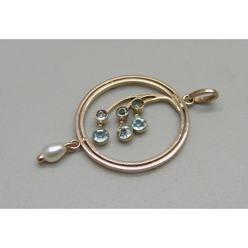 1008 - An Edwardian 9ct gold, blue stone and pearl pendant