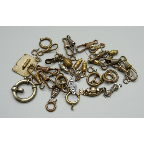 1009 - A collection of clasps and clips including silver