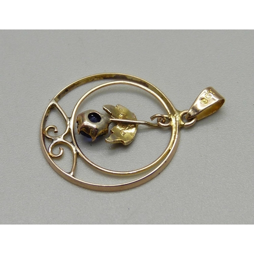 1015 - An Edwardian 9ct gold, blue stone and pearl pendant