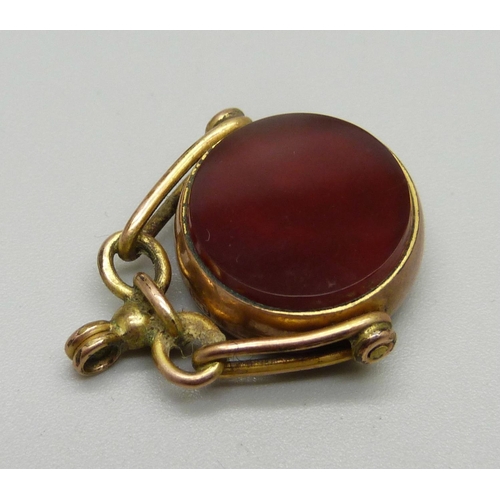 1027 - A 9ct gold mounted swivel fob set with bloodstone and agate, (plated loop mount)