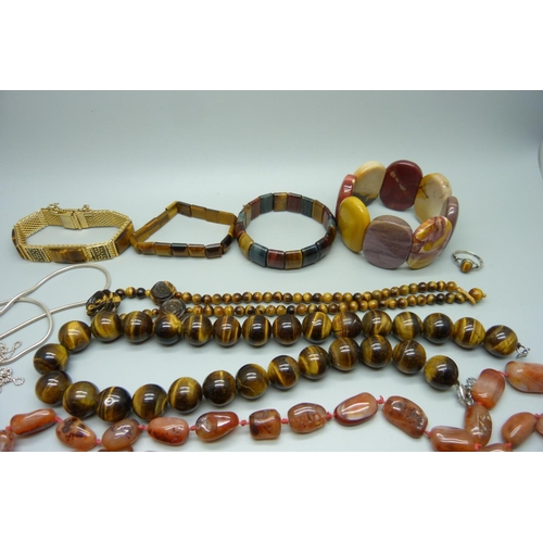 1029 - A collection of tiger's eye jewellery, etc.