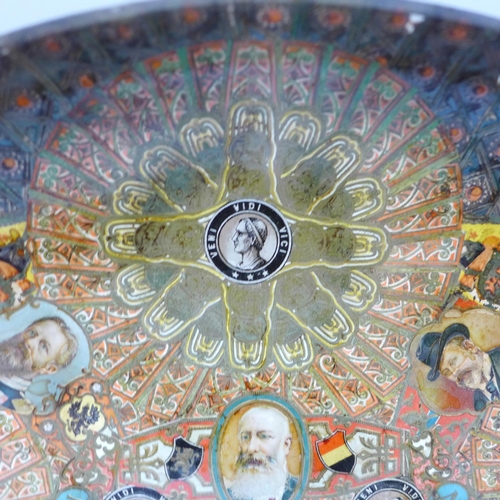 601 - A decoupage shallow bowl in glass with photograph of young boy, (possibly a memorial plate), 31cm