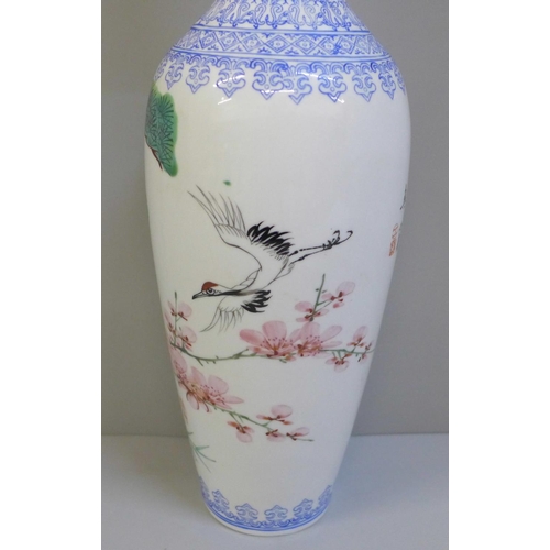 610 - A Chinese eggshell porcelain vase, boxed, 33cm