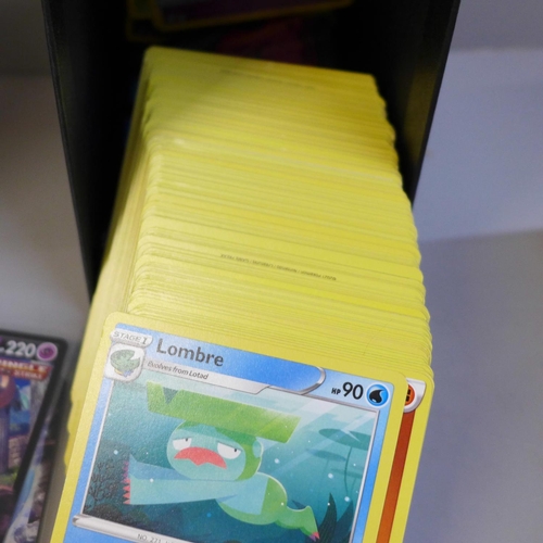 630 - Pokemon cards, set 203, ETB with sleeves, dividers and 207 cards