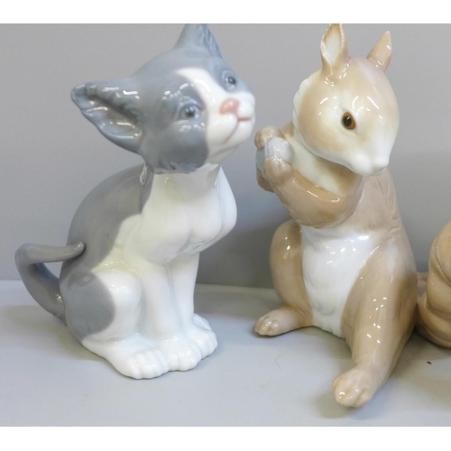 644 - A Lladro squirrel, three cats and a dog