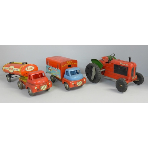650A - A Welsotoys Robin Paint and Poster truck, lacking ladder, a tin-plate Esso petrol tanker and a Tri-a... 