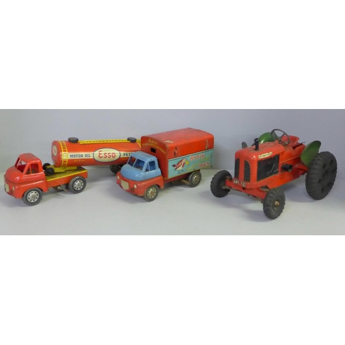 650A - A Welsotoys Robin Paint and Poster truck, lacking ladder, a tin-plate Esso petrol tanker and a Tri-a... 