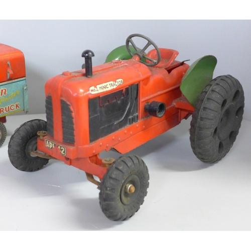 650A - A Welsotoys Robin Paint and Poster truck, lacking ladder, a tin-plate Esso petrol tanker and a Tri-a... 