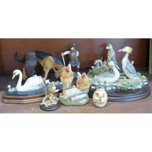 655 - A collection of animal figure groups and a stoneware goblet, some figures a/f