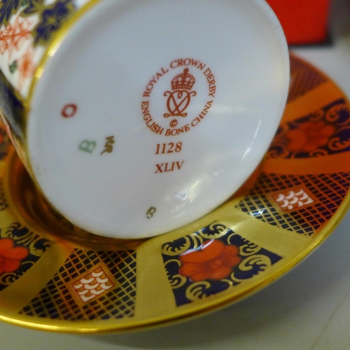 670 - Royal Crown Derby; 1128 pattern coffee can and saucer, two plates and two dishes, 2451 pattern dish ... 