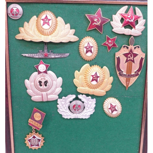 687 - Thirteen modern Russian badges, etc.