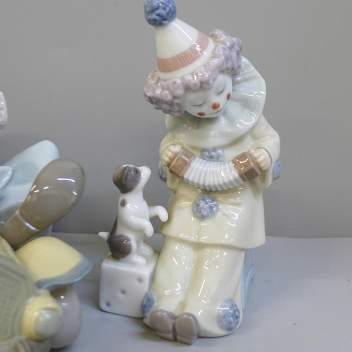 689 - Two Lladro figures of clowns, clown in car a/f and a Lladro figure of a young baseball player on one... 