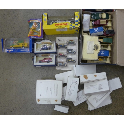 692 - A collection of boxed model vehicles including Lledo, Matchbox, Maisto and Corgi