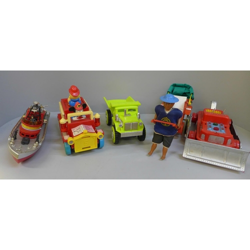 697 - Toys including Marx Hill climbing dump truck, Disney fire engine, Fire Department boat, a boxed bull... 