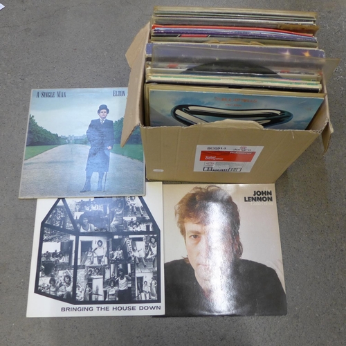 713 - A box of 1970s and 1980s LP records