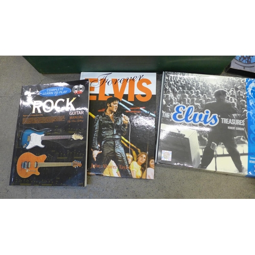 715 - A box of rock VHS videos, Queen, David Bowie, Sex Pistols, Pink Floyd and music books (learn to play... 