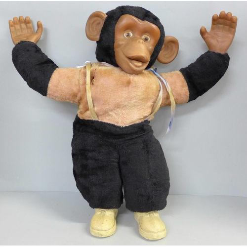 722 - A vintage straw filled chimpanzee, 47cm, a/f