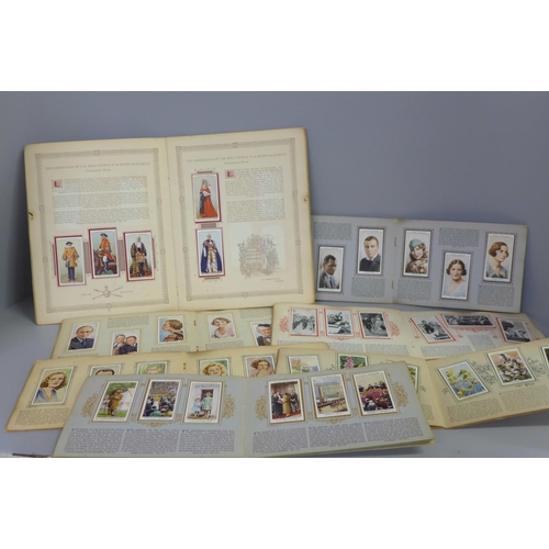 729 - Seven cigarette card albums including radio personalities