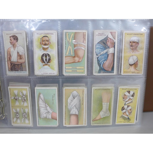 740 - Cigarette cards; an album containing twelve complete sets of cigarette cards including Mitchells (ol... 