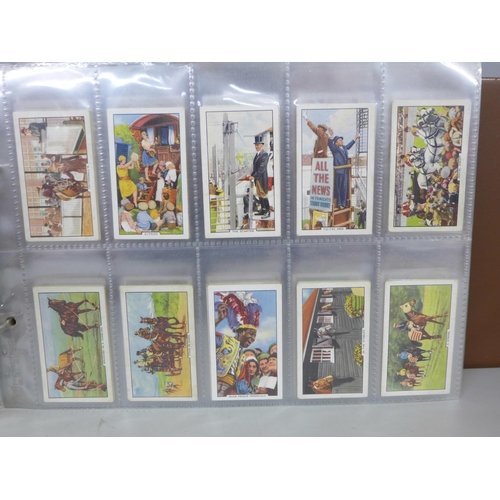 740 - Cigarette cards; an album containing twelve complete sets of cigarette cards including Mitchells (ol... 