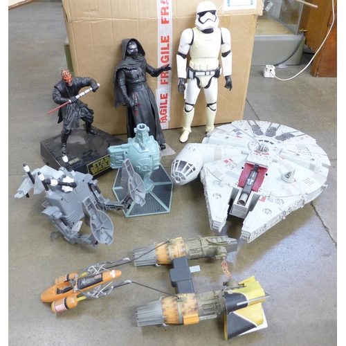 744 - Star Wars:- Millennium Falcon, other vehicles, a battery operated Darth Maul figure, Stormtrooper, e... 
