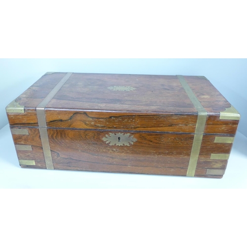 750 - A rosewood and brass bound box
